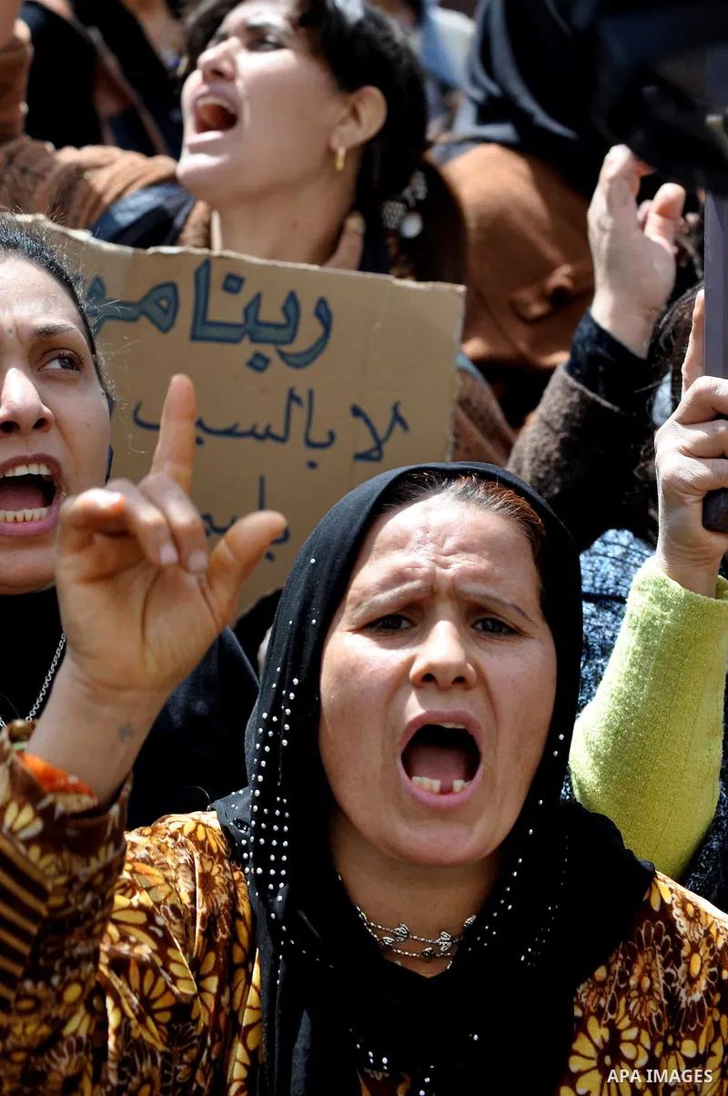 Egyptian Coptic Christians take part in a protest in front of the Information center building in Cairo, Egypt, 09 March 2011. The Coptic Christians were protesting over the burning of a church in Cairo suburbs on 04 Marc...