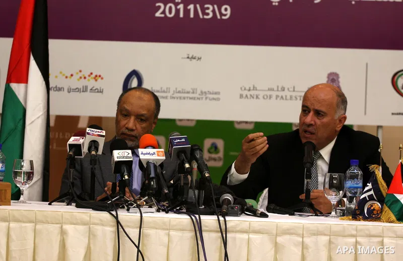 President of the Asian Football Confederation (AFC) Mohamed Bin Hammam and Palestinian Football Association chairman Jibril Rajoub give a news conference in the West Bank city of Ramallah on March 9, 2011 on the upcoming...