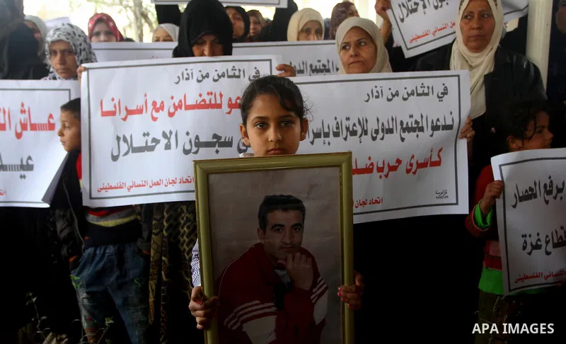 Palestinian women take part in a demonstration organized by the Democratic Front for the Liberation of Palestine (DFLP), calling to end the Palestinian internal division between Hamas and Fatah, outside the International...