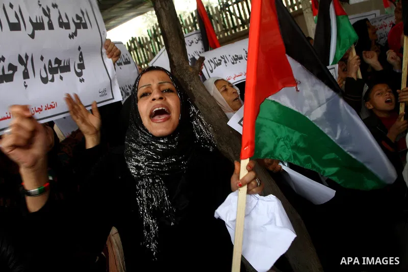 Palestinian women take part in a demonstration organized by the Democratic Front for the Liberation of Palestine (DFLP), calling to end the Palestinian internal division between Hamas and Fatah, outside the International...