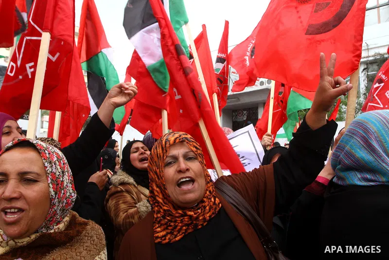 Palestinian women take part in a demonstration organized by the Democratic Front for the Liberation of Palestine (DFLP), calling to end the Palestinian internal division between Hamas and Fatah, outside the International...