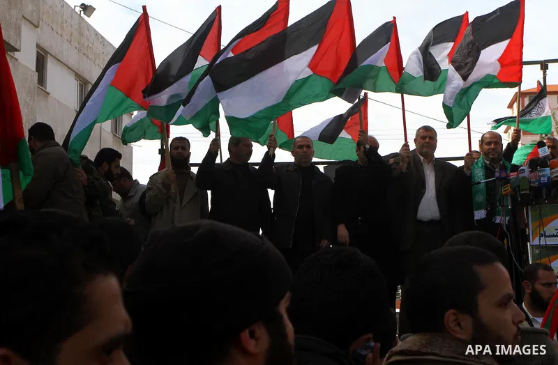 Palestinians attend a rally calling for national reconciliation between the rival Palestinian leading factions Hamas in Gaza and Fatah in the West Bank, in Gaza City, Friday, March 11, 2011. Members of major Palestinian...