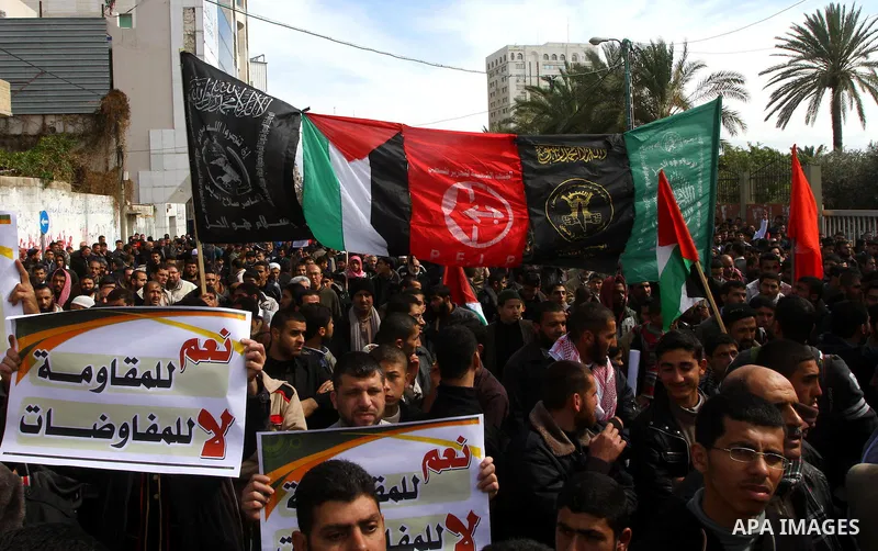 Palestinians attend a rally calling for national reconciliation between the rival Palestinian leading factions Hamas in Gaza and Fatah in the West Bank, in Gaza City, Friday, March 11, 2011. Members of major Palestinian...