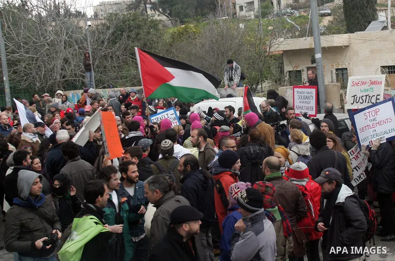 Palestenian, Israeli and foreigners activists take part in a demonstration in Sheikh Jarrah in East Jerusalem on March 11, 2011. Photo by Mahfouz Abu Turk