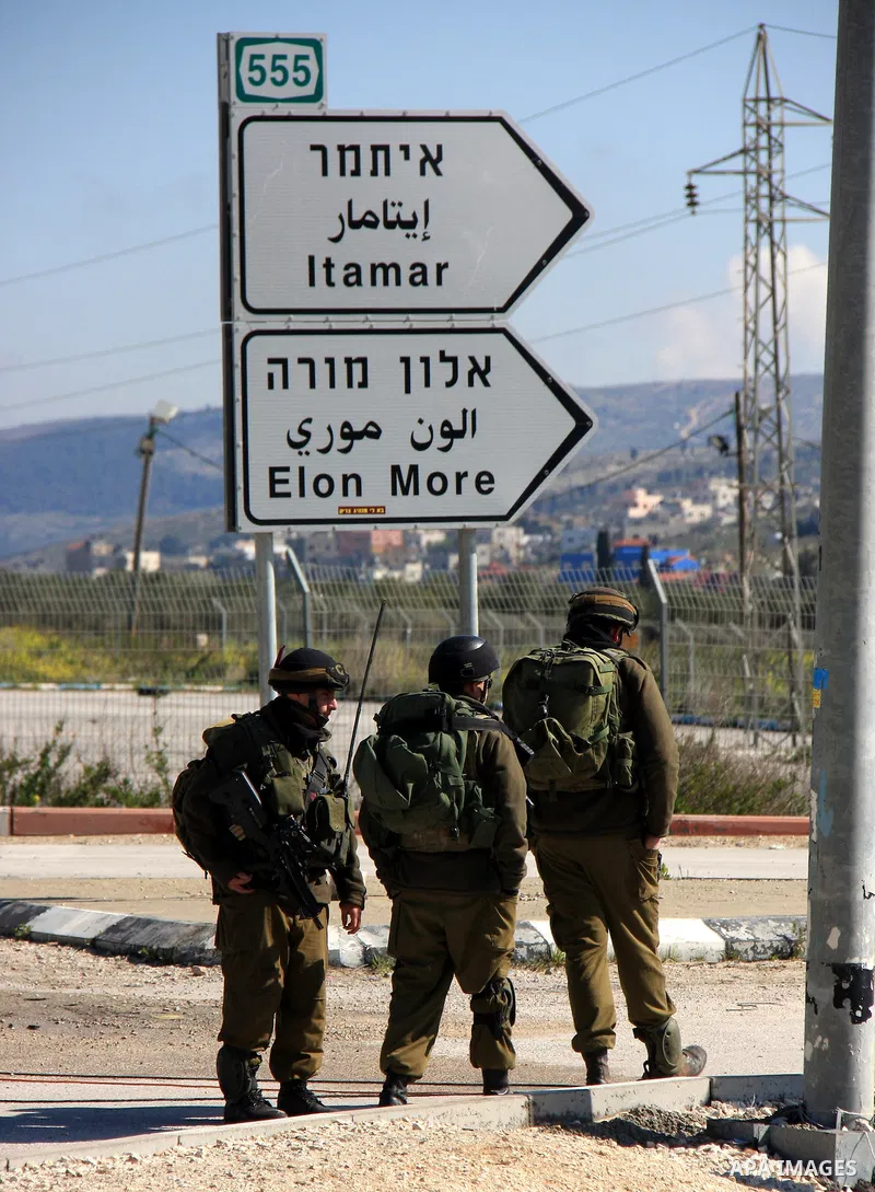 Israeli troops operate in the West Bank village of Awarta, after five people were killed in the nearby Jewish settlement of Itamar Saturday, March 12, 2011. A Palestinian infiltrated Itamar early Saturday and killed five...