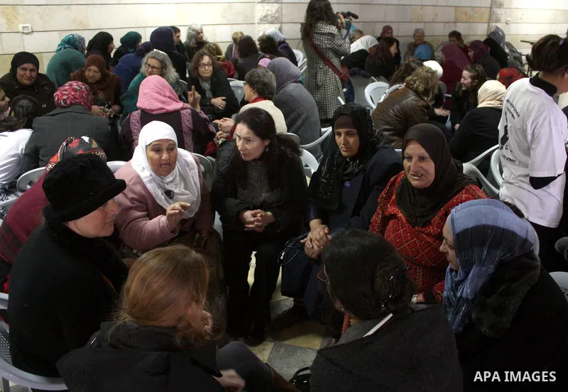 Palestinian and israeli women take part in a Palestinian_Jewish conference of the occasion of the 100th International Womens Day on March 12,2011 in Beit Omar village near the West Bank city of Hebron. Photo by Najeh Has...
