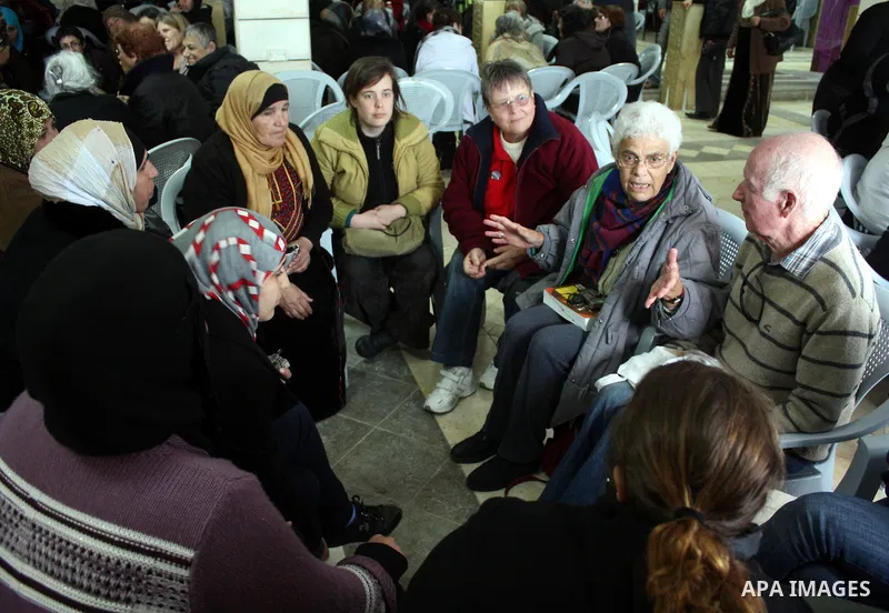 Palestinian and israeli women take part in a Palestinian_Jewish conference of the occasion of the 100th International Womens Day on March 12,2011 in Beit Omar village near the West Bank city of Hebron. Photo by Najeh Has...