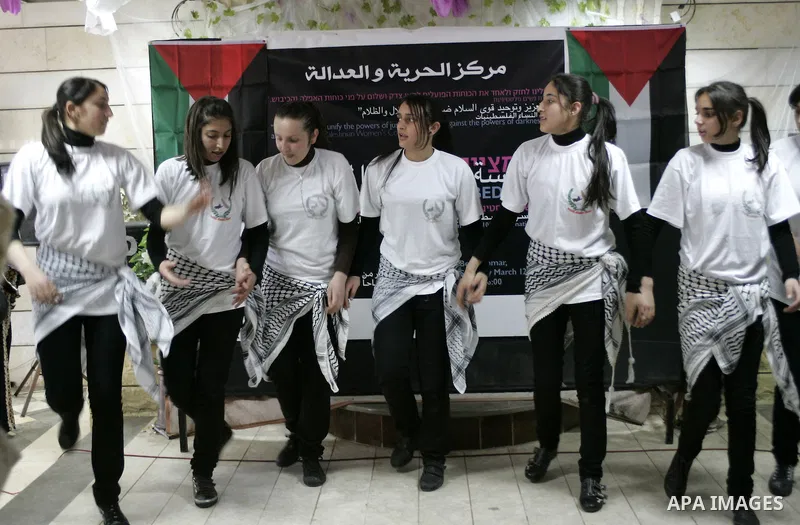 Palestinian and israeli women take part in a Palestinian_Jewish conference of the occasion of the 100th International Womens Day on March 12,2011 in Beit Omar village near the West Bank city of Hebron. Photo by Najeh Has...