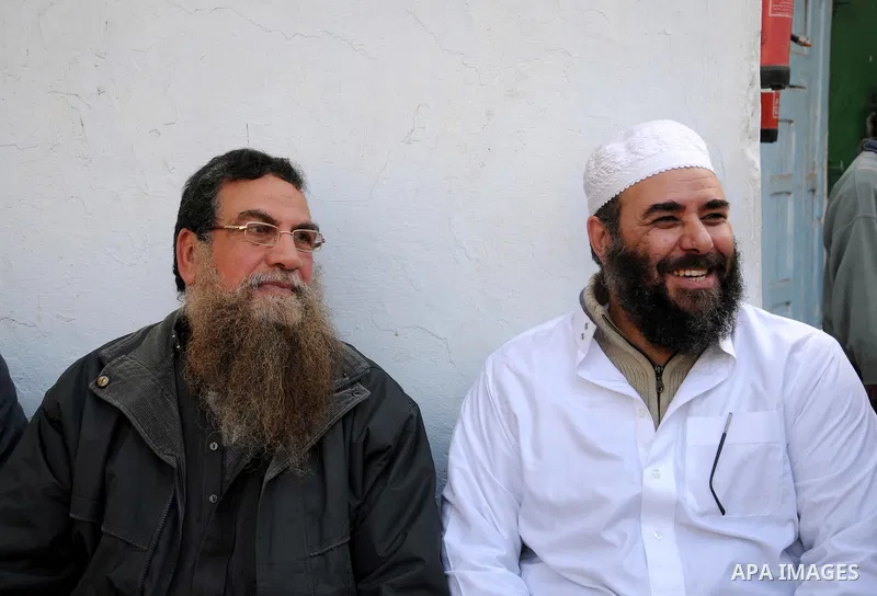 Egyptian Abbud and Tareq al-Zomor, members of Egypt's Islamic Jihad, are seen after being released form the Tura jail, in Hilwan on the outskirts of Cairo, on March 12, 2011, after Egypt's new military rulers ordered the...