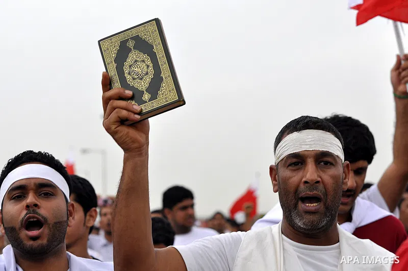 Tens of thousands of Bahraini anti-government protesters converged from two directions Saturday, March 12, 2011, to demonstrate outside the walls of King Hamad bin Isa Al Khalifa's Safriya palace in Sadad, Bahrain, south...