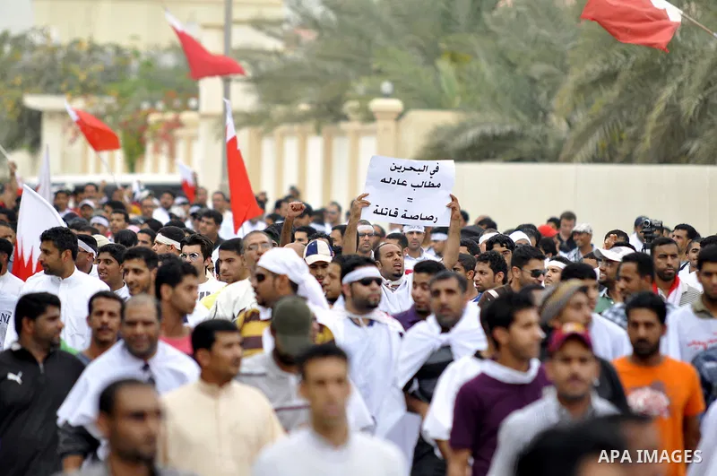 Tens of thousands of Bahraini anti-government protesters converged from two directions Saturday, March 12, 2011, to demonstrate outside the walls of King Hamad bin Isa Al Khalifa's Safriya palace in Sadad, Bahrain, south...