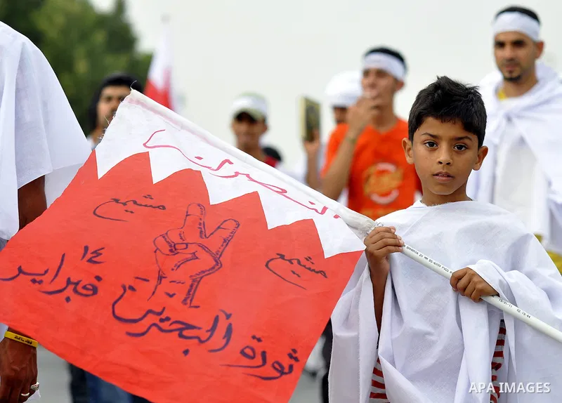 Tens of thousands of Bahraini anti-government protesters converged from two directions Saturday, March 12, 2011, to demonstrate outside the walls of King Hamad bin Isa Al Khalifa's Safriya palace in Sadad, Bahrain, south...