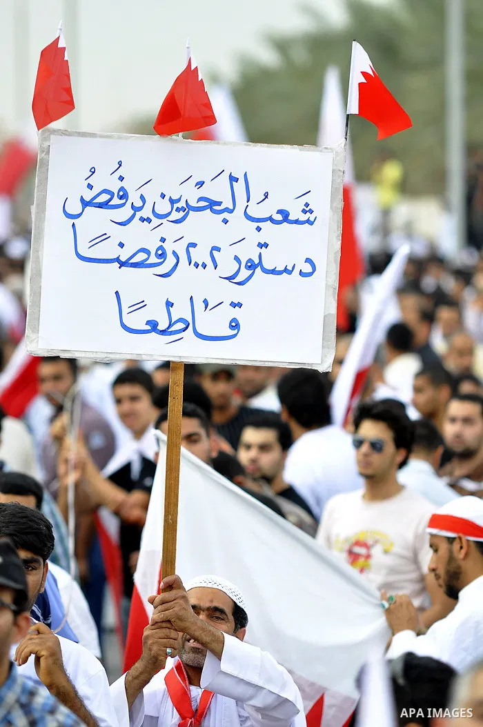 Tens of thousands of Bahraini anti-government protesters converged from two directions Saturday, March 12, 2011, to demonstrate outside the walls of King Hamad bin Isa Al Khalifa's Safriya palace in Sadad, Bahrain, south...