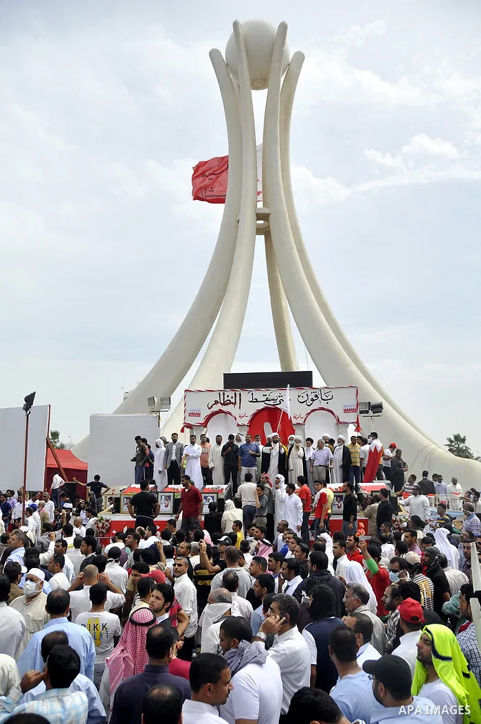 Bahraini anti-government protesters demonstrate near the Pearl roundabout Sunday, March 13, 2011, in Manama, Bahrain. Photo by Ammar A.rasool