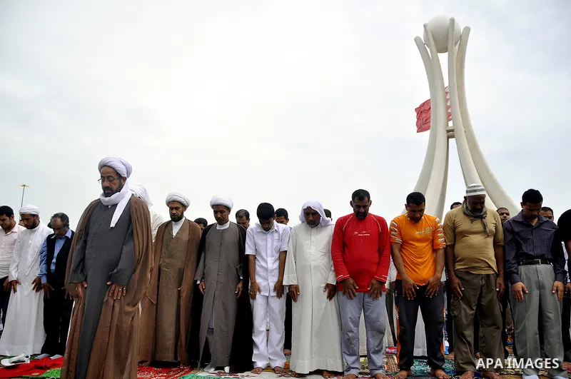 Bahraini anti-government protesters demonstrate near the Pearl roundabout Sunday, March 13, 2011, in Manama, Bahrain. Photo by Ammar A.rasool