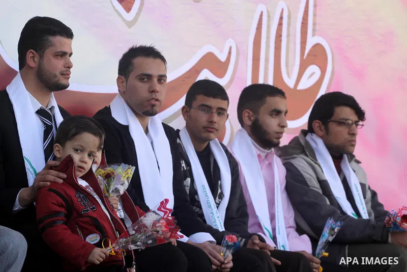Palestinian students are honored during a celebration at the University College of Applied Sciences in Gaza city on March 13,2011.. Photo by Mohammed Asad