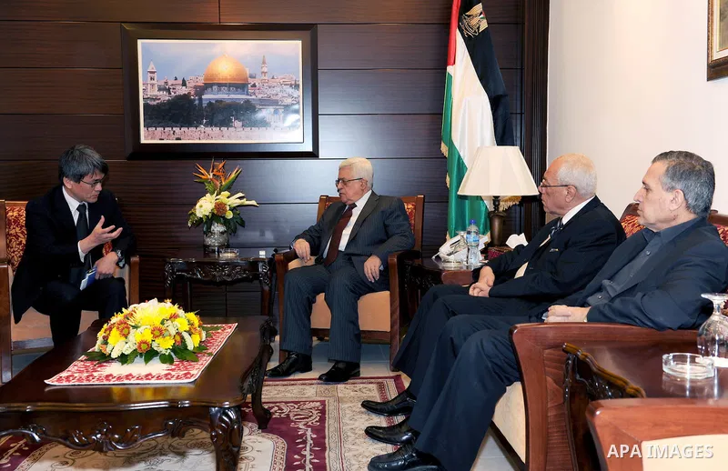 Palestinian President Mahmoud Abbas (Abu Mazen) meets with the Japanese Ambassador in Ramallah in west bank March14,2011 Photo by Thaer Ganaim