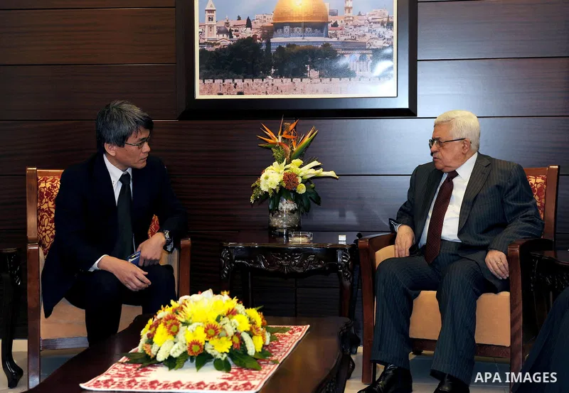 Palestinian President Mahmoud Abbas (Abu Mazen) meets with the Japanese Ambassador in Ramallah in west bank March14,2011 Photo by Thaer Ganaim
