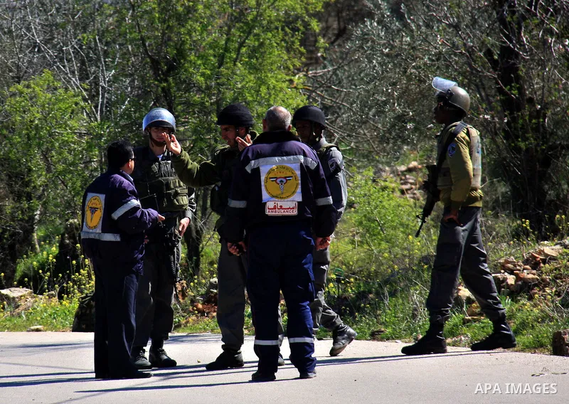 Israeli soldiers set up a temporary checkpoint during a military operation the West Bank village of Awarta, near Nablus, Monday, March 14, 2011. The U.S. Embassy said Monday it was "deeply concerned" by Israel's plans to...