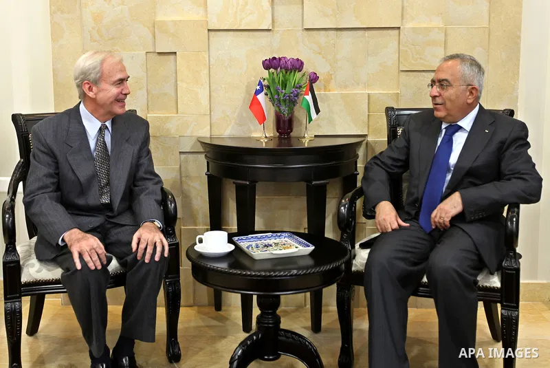 Palestinian Prime Minister Dr. Salam Fayyad meets with the new representative of Chile's government West Bank in the city of Ramallah . march 14 2011 Photo by: Mustafa Abu Dayeh