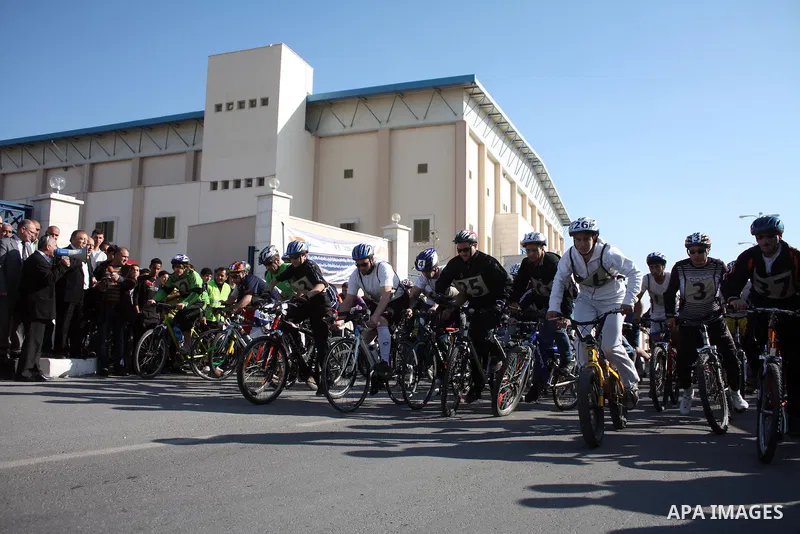 Palestinians compete during cycling race in the West Bank city of Hebron on March 14,2011.This event is the first of it kind on the local level and it was organized by the Palestinian Ministery of youth and sport as a pr...