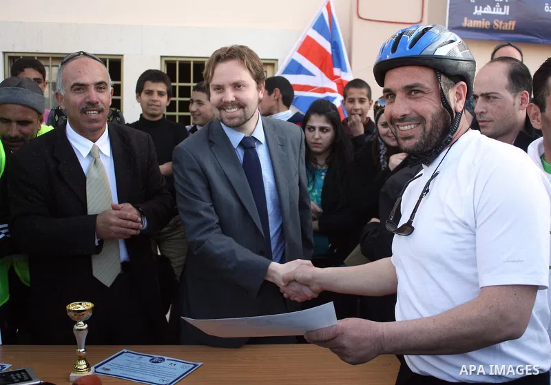 Palestinians compete during cycling race in the West Bank city of Hebron on March 14,2011.This event is the first of it kind on the local level and it was organized by the Palestinian Ministery of youth and sport as a pr...