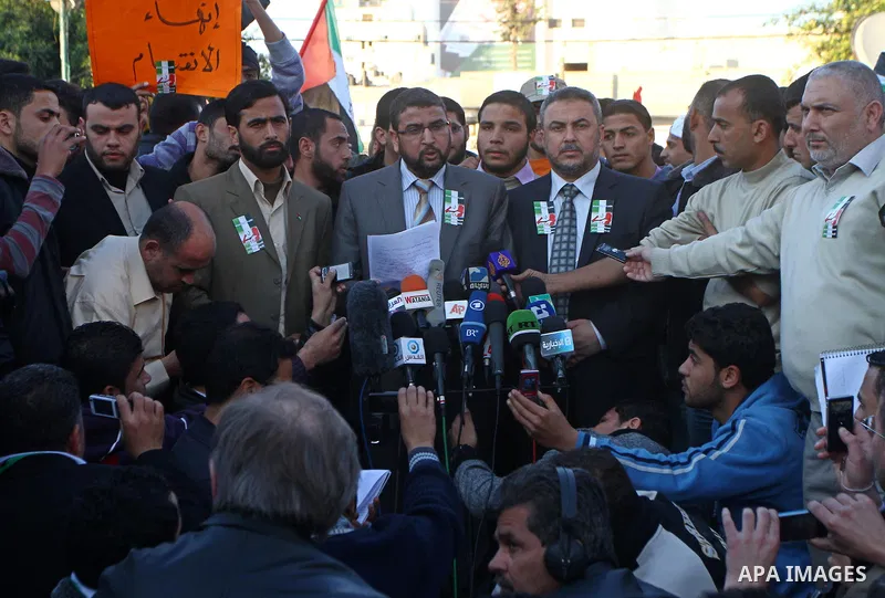 Palestinian Hamas leaders participate in a march calling for a reconciliation between the rival Palestinian leading factions Hamas in Gaza and Fatah in the West Bank, in Gaza City, Monday, March 14, 2011. Photo by Ashraf...