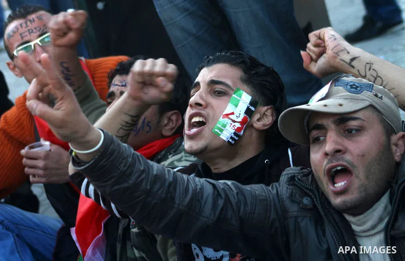 Palestinians participate in a march calling for a reconciliation between the rival Palestinian leading factions Hamas in Gaza and Fatah in the West Bank, in Gaza City, Monday, March 14, 2011. Photo by Ashraf Amra