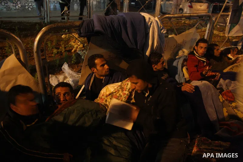 Palestinians on a hunger strike hold signs calling for national unity and an end to the political division, in reference to the bitter split between Gaza's Hamas rulers and the Fatah-dominated Palestinian Authority in th...