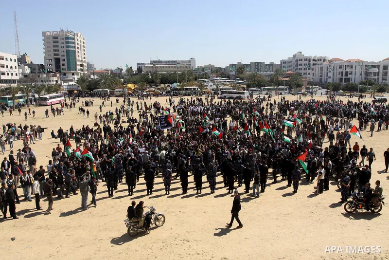 Palestinian demonstrators take part in a protest calling for Palestinian political unity between Gaza's Hamas rulers and the Fatah-dominated Palestinian Authority which rules from Ramallah, on March 15, 2011in Gaza City,...