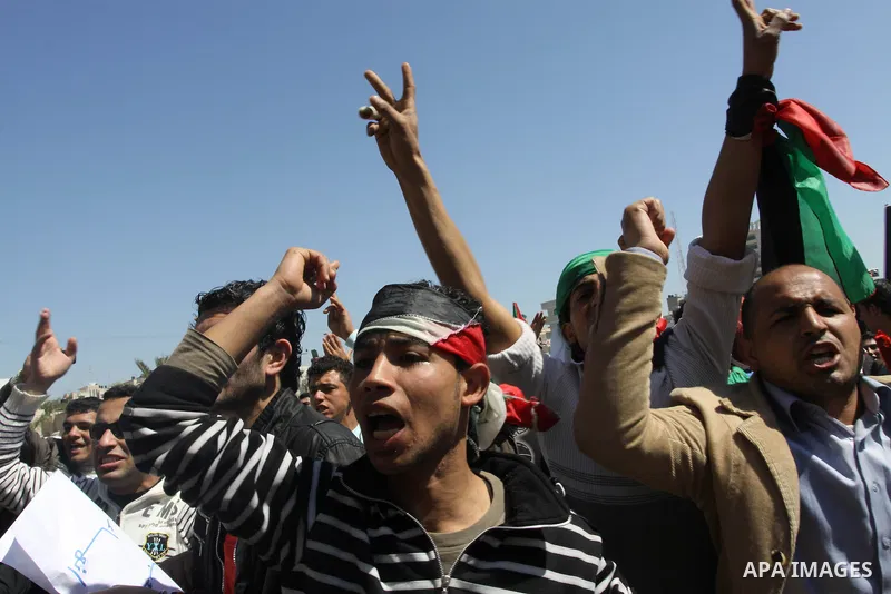 Palestinian demonstrators take part in a protest calling for Palestinian political unity between Gaza's Hamas rulers and the Fatah-dominated Palestinian Authority which rules from Ramallah, on March 15, 2011in Gaza City,...