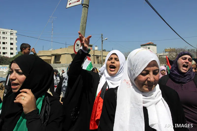 Palestinian demonstrators take part in a protest calling for Palestinian political unity between Gaza's Hamas rulers and the Fatah-dominated Palestinian Authority which rules from Ramallah, on March 15, 2011in Gaza City,...