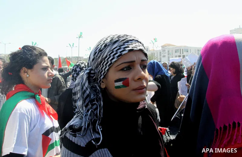 Palestinian demonstrators take part in a protest calling for Palestinian political unity between Gaza's Hamas rulers and the Fatah-dominated Palestinian Authority which rules from Ramallah, on March 15, 2011in Gaza City,...