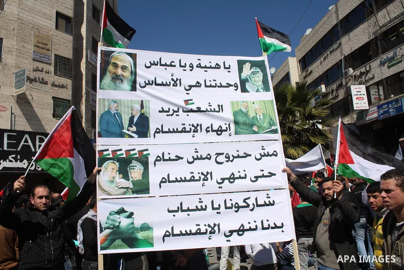 Hamas , Fatah parliamentary lawmakers and Palestinian demonstrators take part in a protest calling for Palestinian political unity between Gaza's Hamas rulers and the Fatah-dominated Palestinian Authority which rules fro...