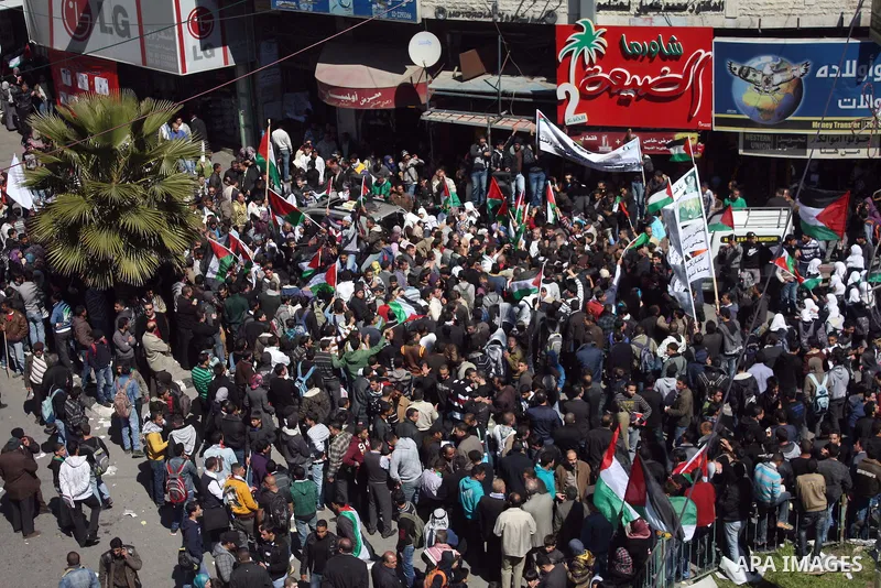 Hamas , Fatah parliamentary lawmakers and Palestinian demonstrators take part in a protest calling for Palestinian political unity between Gaza's Hamas rulers and the Fatah-dominated Palestinian Authority which rules fro...