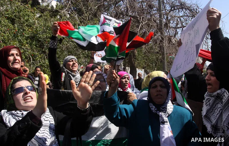 Palestinian demonstrators take part in a protest calling for Palestinian political unity between Gaza's Hamas rulers and the Fatah-dominated Palestinian Authority which rules from Ramallah, on March 15, 2011in Gaza City,...