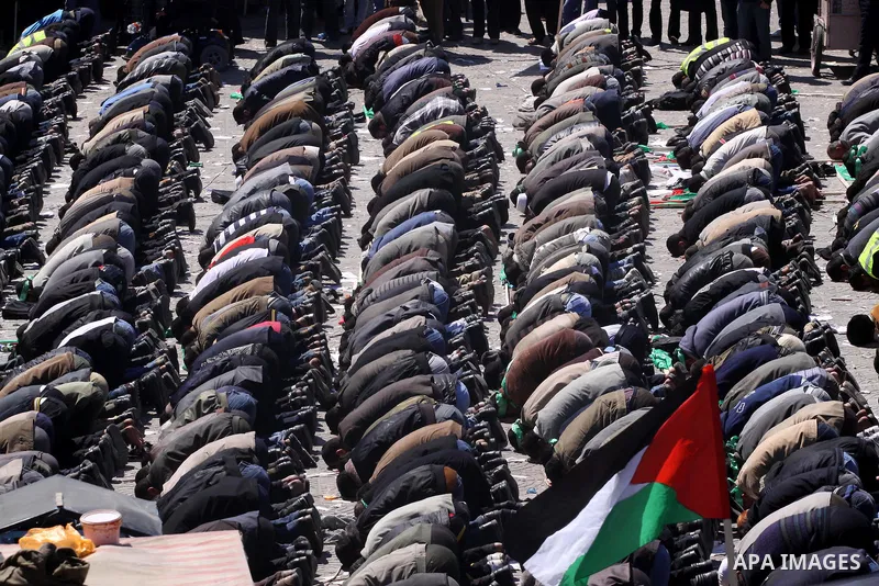 Palestinian demonstrators pray during a protest calling for Palestinian political unity between Gaza's Hamas rulers and the Fatah-dominated Palestinian Authority which rules from Ramallah, on March 15, 2011in Gaza City,...