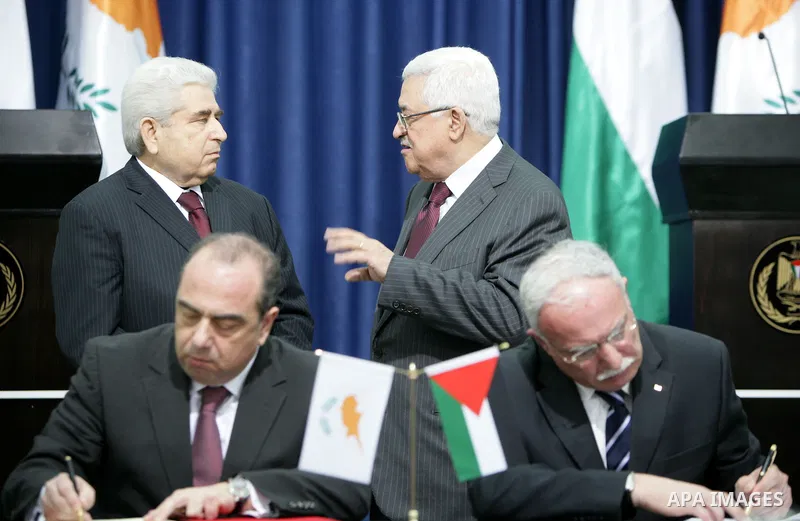 Palestinian President Mahmoud Abbas and Cypriot President Dimitris Christofias attend a press conference in the West Bank city of Ramallah March 15, 2011. Christofias is on an official visit to Israel and the Palestinian...