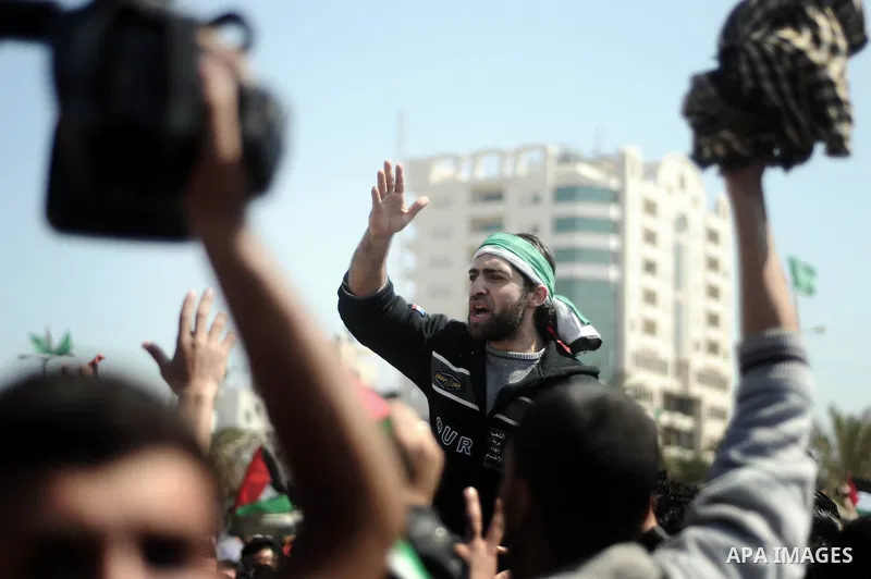 Palestinian demonstrators take part in a protest calling for Palestinian political unity between Gaza's Hamas rulers and the Fatah-dominated Palestinian Authority which rules from Ramallah, on March 15, 2011in Gaza City,...