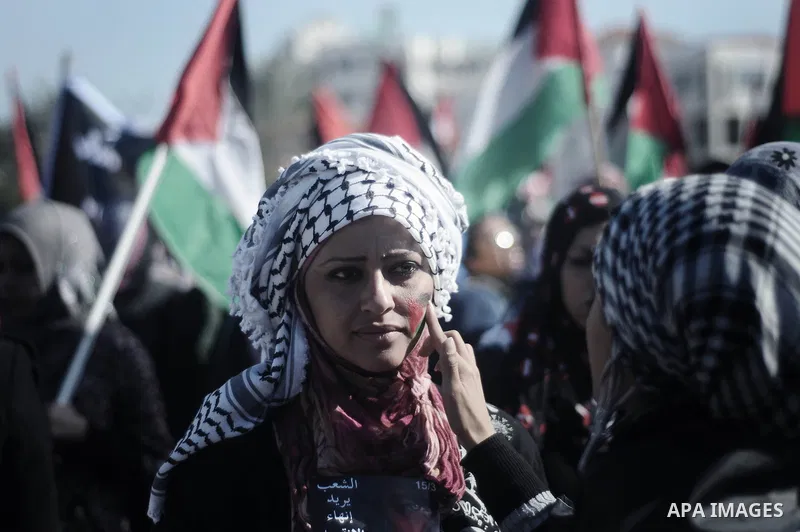 Palestinian demonstrators take part in a protest calling for Palestinian political unity between Gaza's Hamas rulers and the Fatah-dominated Palestinian Authority which rules from Ramallah, on March 15, 2011in Gaza City,...