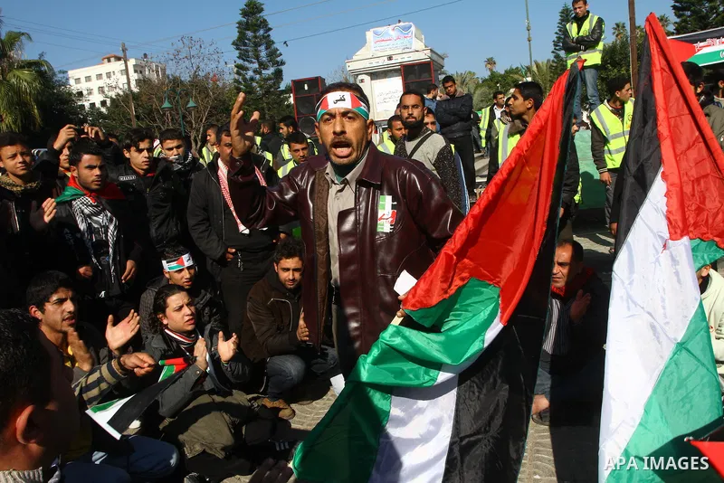 Palestinian demonstrators take part in a protest calling for Palestinian political unity between Gaza's Hamas rulers and the Fatah-dominated Palestinian Authority which rules from Ramallah, on March 15, 2011in Gaza City,...