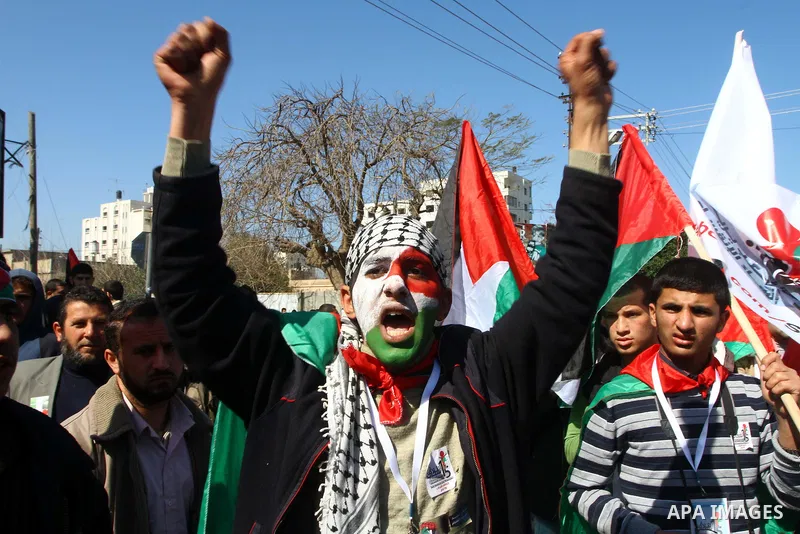 Palestinian demonstrators take part in a protest calling for Palestinian political unity between Gaza's Hamas rulers and the Fatah-dominated Palestinian Authority which rules from Ramallah, on March 15, 2011in Gaza City,...