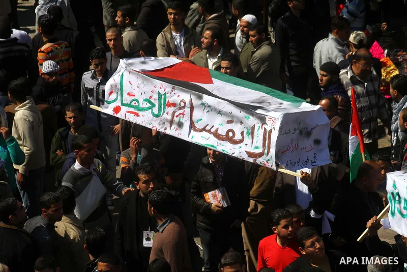 Palestinian demonstrators take part in a protest calling for Palestinian political unity between Gaza's Hamas rulers and the Fatah-dominated Palestinian Authority which rules from Ramallah, on March 15, 2011in Gaza City,...