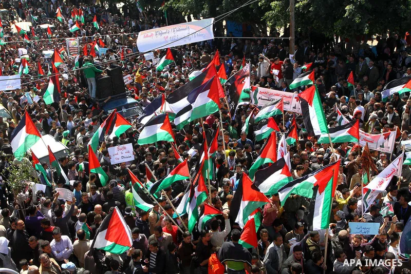 Palestinian demonstrators take part in a protest calling for Palestinian political unity between Gaza's Hamas rulers and the Fatah-dominated Palestinian Authority which rules from Ramallah, on March 15, 2011in Gaza City,...