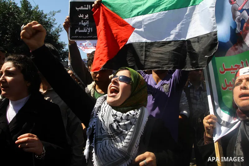 Palestinian demonstrators take part in a protest calling for Palestinian political unity between Gaza's Hamas rulers and the Fatah-dominated Palestinian Authority which rules from Ramallah, on March 15, 2011in Gaza City,...