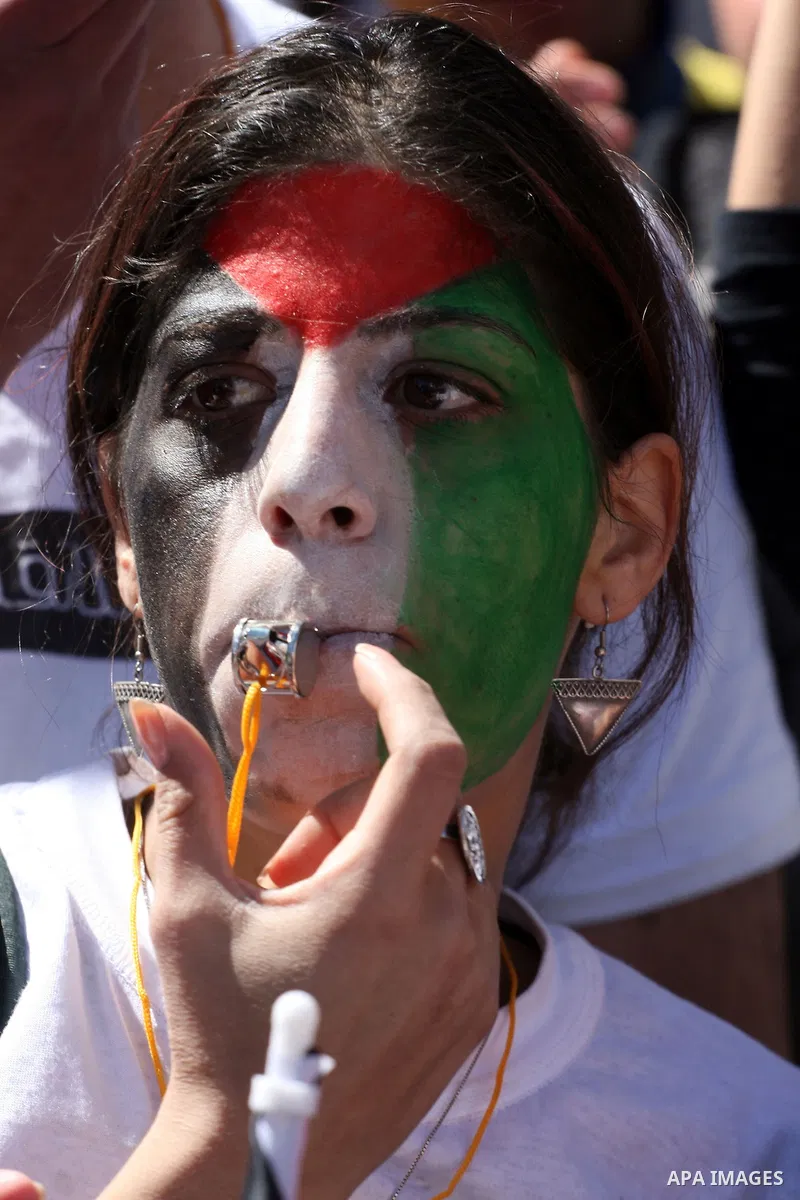 Palestinian demonstrators take part in a protest calling for Palestinian political unity between Gaza's Hamas rulers and the Fatah-dominated Palestinian Authority which rules from Ramallah, on March 15, 2011 in Ramallah,...
