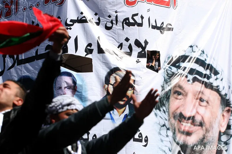 Palestinian demonstrators take part in a protest calling for Palestinian political unity between Gaza's Hamas rulers and the Fatah-dominated Palestinian Authority which rules from Ramallah, on March 15, 2011 in Ramallah,...