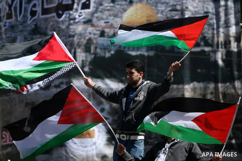 Palestinian demonstrators take part in a protest calling for Palestinian political unity between Gaza's Hamas rulers and the Fatah-dominated Palestinian Authority which rules from Ramallah, on March 15, 2011 in Ramallah,...