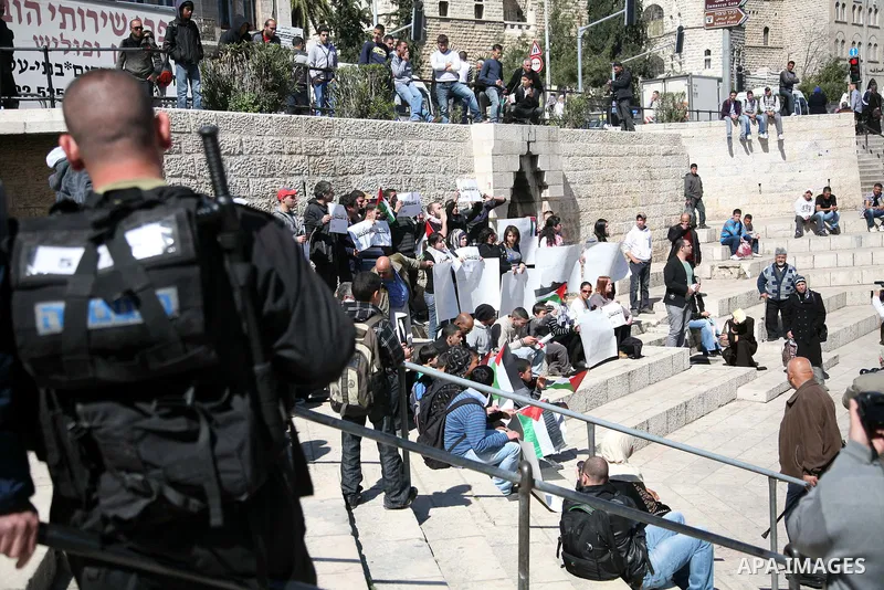 Palestinian demonstrators take part in a protest calling for Palestinian political unity between Gaza's Hamas rulers and the Fatah-dominated Palestinian Authority which rules from Ramallah, on March 15, 2011 in front of...