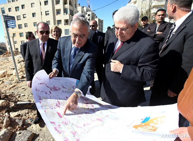 Palestinian Prime Minister Salam Fayyad explains to the Cypriot President Dimitris Christofias the obstacles and limitations imposed by the separation wall and the settlements and the areas known as area C in the West Ba...